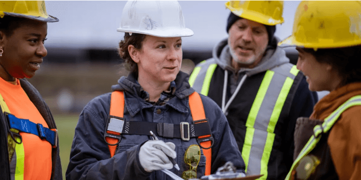 Construction professionals collaborating on site